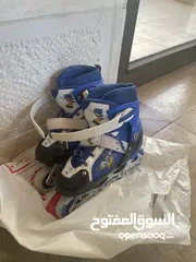  2 حذاء لديه عجلات للأطفال roller skate