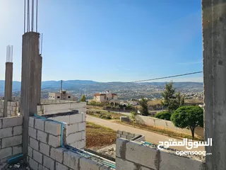  4 ارض مع بيت للبيع