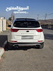  16 سبورتج ماتور 2000 ديزل 4*4 فل اضافات مع بانو راما