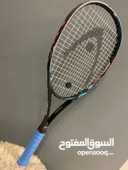  20 كرات تنس إرضي ومضارب