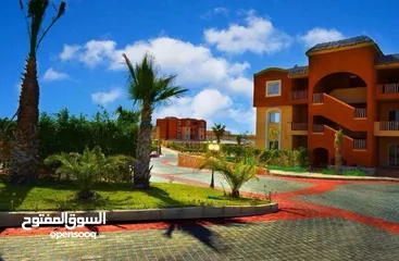  1 شالية 61م للبيع بقرية بانجلوز North Coast Bungalows بالكيلو 73متشطب كاملا Super LUX