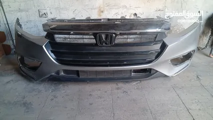  1 طمبون امامي +طقم شلات + دفيوزر سفلي اصلي  ((هوندا انسايت 2020 ))