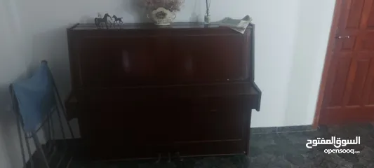  1 بيانو روسي خشبي