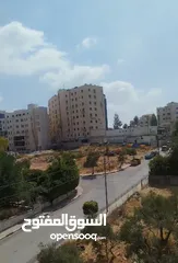  6 شقه للبيع عمارة اربع طوابق مصعد عمر البناء18سنه مفرق شارع المحكمه وللارسال