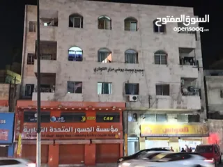  1 مجمع تجاري و سكني ب دخل سنوي 40-45 الف مؤجر بالكامل