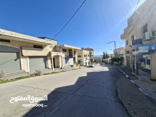  2 محلات تجارية للايجار في يعبد في موقع استراتيجي