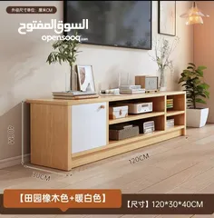 10 خزانة مزنزن تلفزيون خشبية عصرية تصميم أنيق يجمع بين الخشب الطبيعي والأبواب البيضاء ليضيف لمسة .
