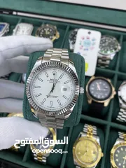  26 رولكس رجالي مرفق علبه وكيس رولكس وكفاله سنه