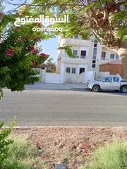  1 شقة أرضية شارع الكويتي الرئيسي للبيع