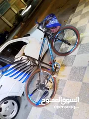  23 بيع بسكليت بحاله جيده جدااا اللون اسود وازرق واضح بالصوره غيارات شغاله وبرك شغال 100%