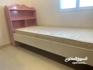  1 Pink color bed with mattress + 2 shelf