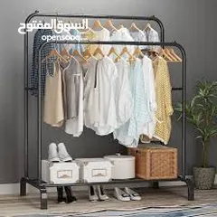  11 ستاند تعليق الملابس بشكل انيق المعدني  بعجلات
