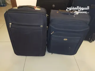  4 travel suitcases for sale