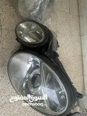  1 اضوية مرسيدس -e200 زينون بحالة الوكالة 2003-2006