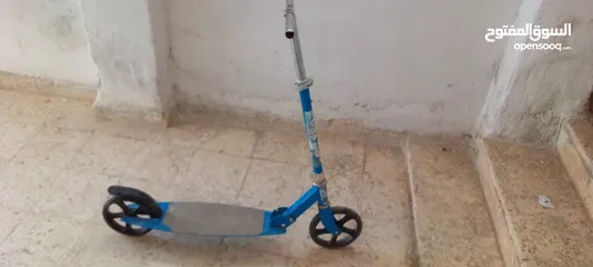  19 العاب اطفال  سكوترات الحجم الكبير وعربايتين اطفال نظاف وشغالات