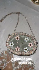  1 شنطة كتف لون زيتي