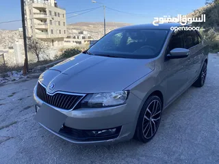  1 سكودا رابيد 2019 دهان شركة ممشى قليل 97 الف ك/م