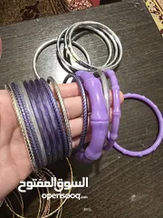  18 اساور بلاستيك بنفسجي، وفضي عدد 15