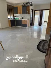  1 شقة جديدة غير مفروشة للإيجار – عين منجد (قرب مطعم تغميسة وعلى مقربة من جميع الخدمات)