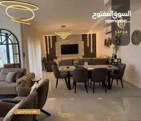  3 شقة مميزة جداً واسعة بتشطيب حديث للبيع في عين منجد في عمارة عصرية راقية