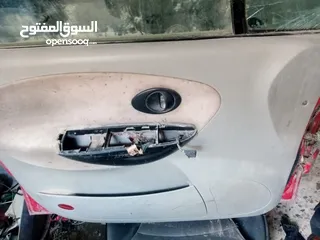  13 اربع ابواب وغطا امامي وغطا خلفي لشيري QQ 2006