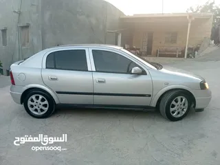  2 اوبل استرا بوضع الشركة الله يبارك لصاحب النصيب مكيف شغال بصلاة ع النبي بوضع المستورد السيارة لقطة
