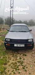  9 بكب متسوبيشي ياباني اصلي L200 2000