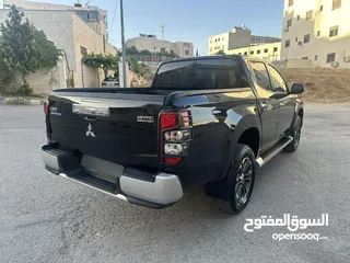  13 ميتسوبيشي L200 سبورتيرو موديل 2022 أعلى صنف مع ديفلوك للبيع