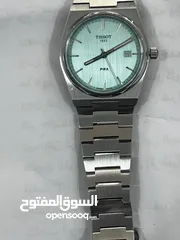  4 للبيع ساعة ماركة Tissot 1853 PRX Swiss Made لون جميل استعمال مرتين يوجد بها ملحقات الخاصة