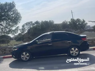  10 كيا فورتي 2009 , فتحة سقف، اوتومات 4 غيار