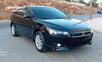  16 متسوبيشي لانسر فراشة موديل 2015 فحص مرفق مع الصور بحالة الوكاااااالة  ماشية 49 الف km  أصلي