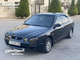  1 كيا شوما 1999