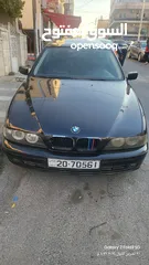  1 BMW 520i الدب