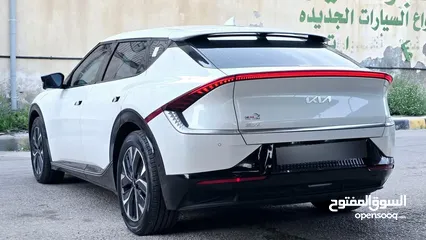  8 2022 كيا ايفي 6 وارد كوري فل كامل ما عدا بانوراما مميزة جدا دفع رباعي بطارية كبيرة