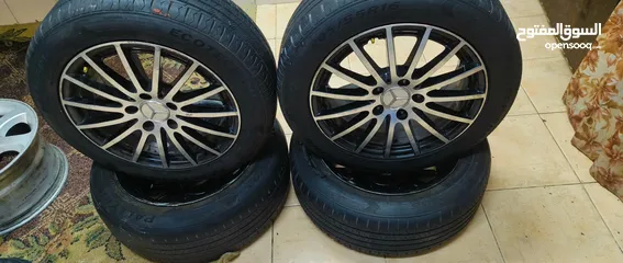  11 جنوط مرسيدس مع كوشوك نضيف جدا جدا استخدام شهر مع جنط سبير
