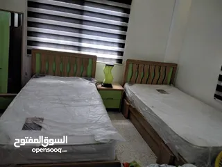  1 غرفتين نوم مستعمله وحده شبابي ووحده بناتي مع فرشاتهن استعمال خفيف جدا خشب لمنات