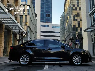  12 تويوتا كورولا هايبرد فحص كامل وارد المركزية وصيانة المركزية لون اسود مميز بحالة جيدة جدا كوشوك جديد