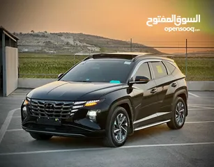  1 هونداي توسان/2022 فل الفل فتحة سقف بانوراما  2x4 ///240Hp بنزين + كهرباء  ( Haybrid) 1600cc