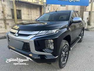  1 ميتسوبيشي L200 سبورتيرو موديل 2022 أعلى صنف مع ديفلوك للبيع