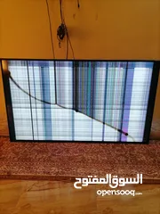  1 تلفاز 65 بوصه شاشه منكسره