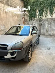  2 هونداي توسان 2009 للبيع بحاجة إلى دهان خارجي فقد