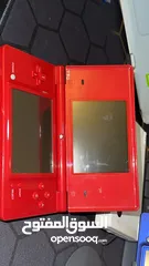 2 Dsi Red hacked with 20+ games , charger and pen