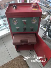  5 جهاز فحص سيارات  كومبيوتر وجهاز تنظيف بخاخات