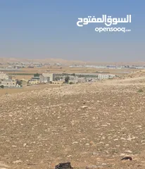  2 للبيع ارض 917 م الذهيبه الغربيه شارعين صخريه ومرتفعه مطله على شارع الميه