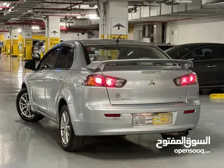  9 ميتسوبيشي لانسر 2016 كرت ابيض