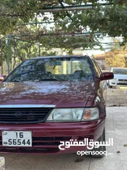  4 نيسان صني 1998 أربعه جيد قصعات دهان جديد ماتور 1600cc بيان جمركي جديد وجير جديد أوتوماتيك