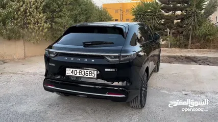  13 Honda E:NS1 E4 electric 2023  هوندا e:ns1 فئة E4 فل اضافات، اسود ميتاليك، داخليه لون ابيض فخمة