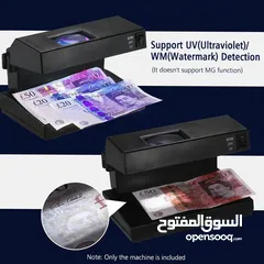 23 جهاز كشف النقود الورقية المزورة
