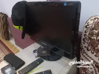  2 كمبيوتر وشاشة تلفاز أزوز