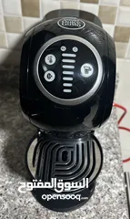  1 Nescafe Dolce Gusto machine + Holder capsule ماكنة نسكافيه دولتشي غوستو + حمالة كبسولات